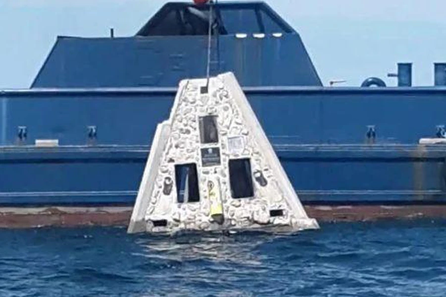 Artificial reef being placed into the ocean